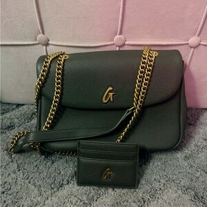 Chic Black Crossbody Bag with Gold Accents